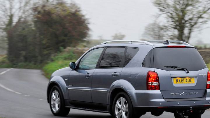 Running 2012 SsangYong Rexton In Grey Back Pose